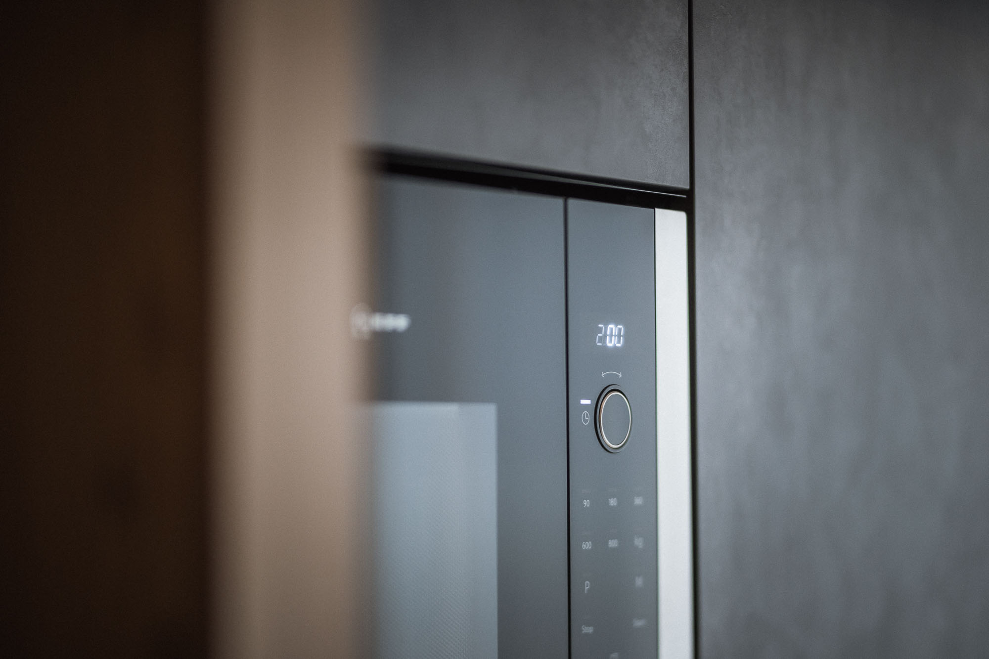 Mikrowelle im Apartment AhriaNova - AHRIA Apartments