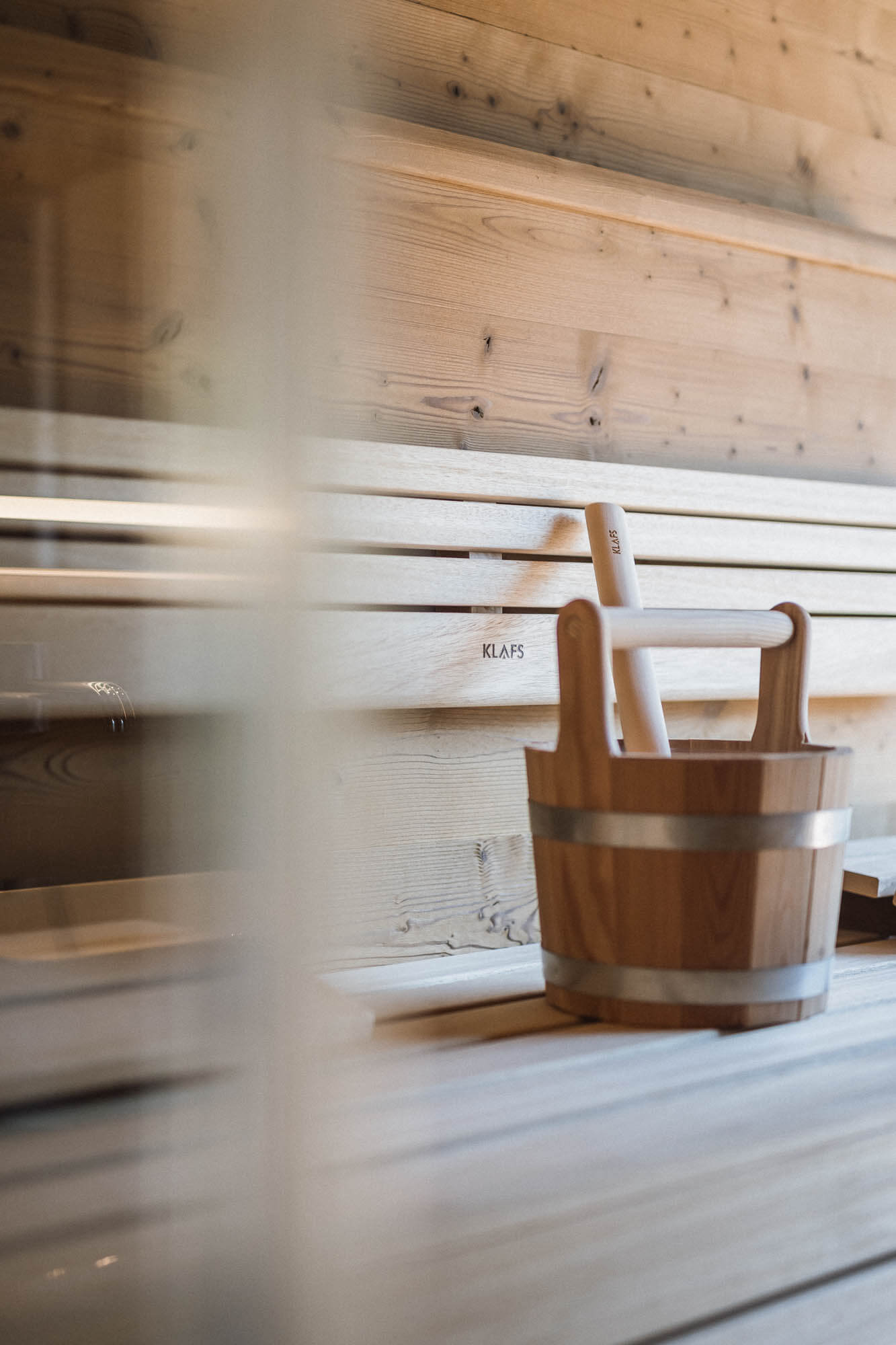 Private Sauna mit Aufgusseimer im AhriaPura Apartment - AHRIA Apartments