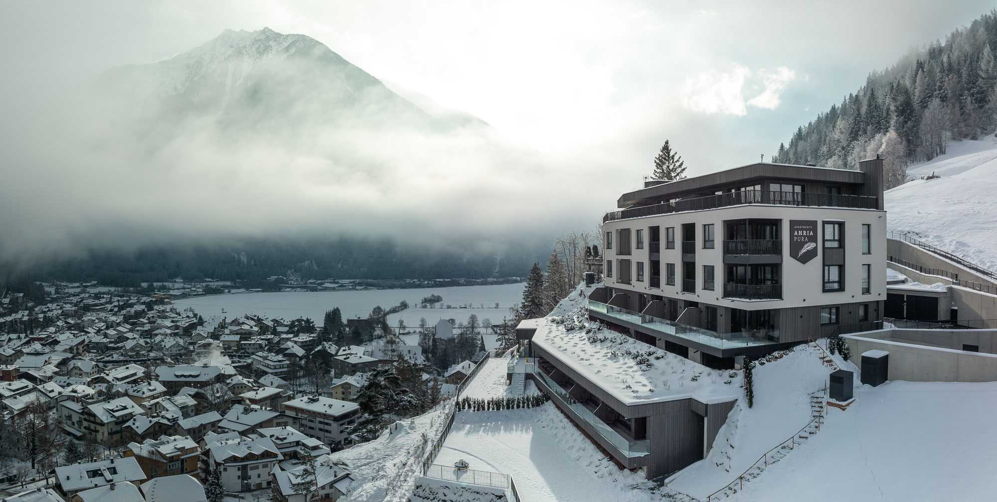 Apartment AhriaPura und Sand in Taufers in Schnee gehüllt - AHRIA Apartments